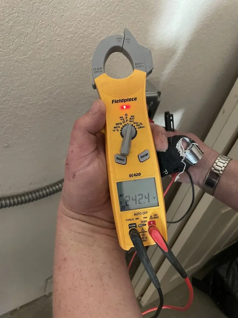 Voltage testing with clamp meter during Outlet Installation in Pittston